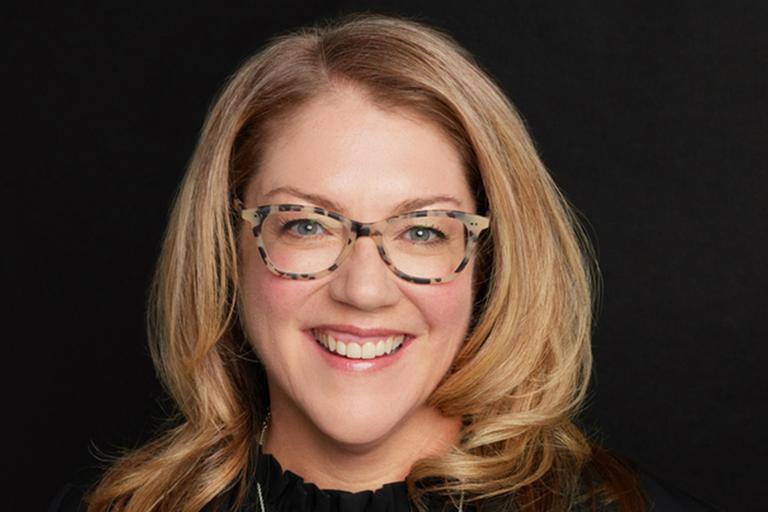 Portrait of Jina Abells Morissette, leadership advisor at Russell Reynolds Associates