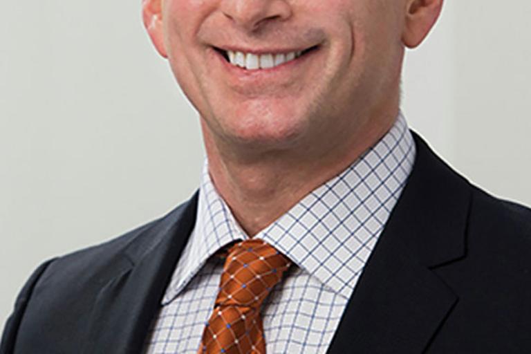 Portrait of Jett Pihakis, leadership advisor at Russell Reynolds Associates