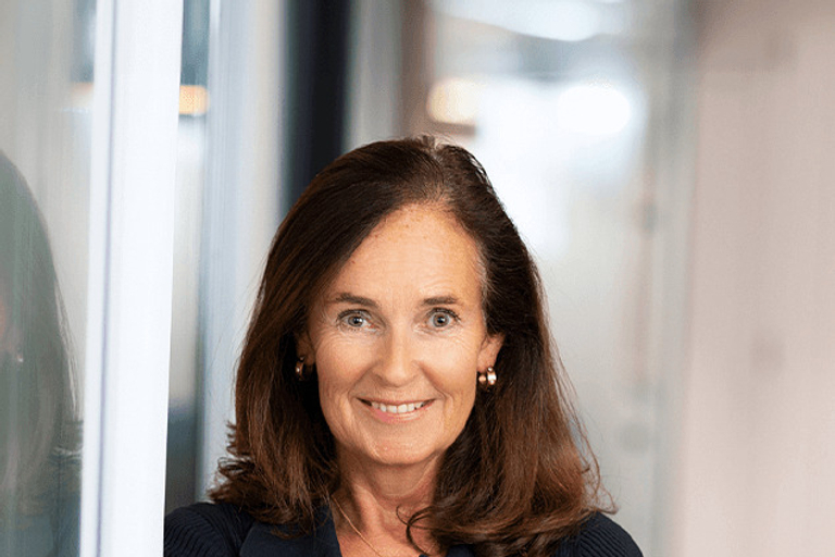 Portrait of Dee Symons, leadership advisor at Russell Reynolds Associates
