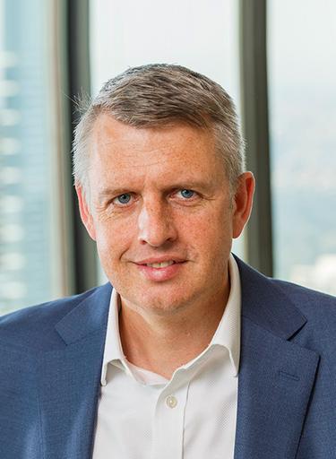 Portrait of Nick Fletcher, leadership advisor at Russell Reynolds Associates
