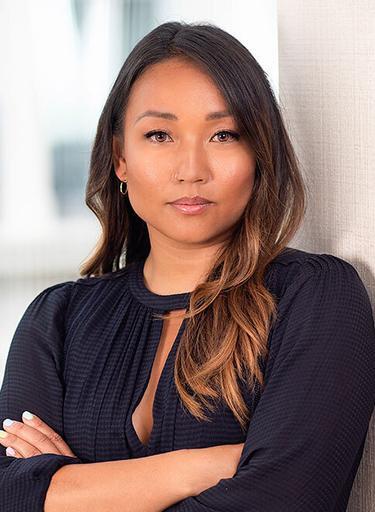 Portrait of Emmelin Teng, leadership advisor at Russell Reynolds Associates