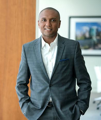 Portrait of Evan C. Sharp, leadership advisor at Russell Reynolds Associates