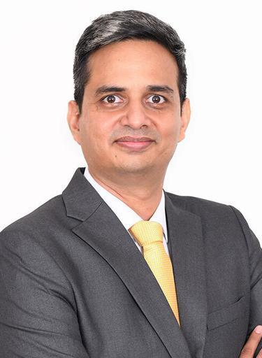 Portrait of Anant Kasibhatla, leadership advisor at Russell Reynolds Associates