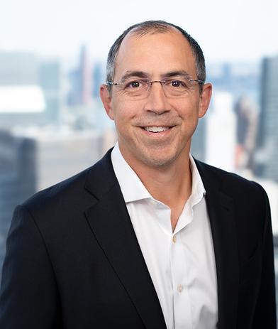 Portrait of Justin Cerilli, leadership advisor at Russell Reynolds Associates