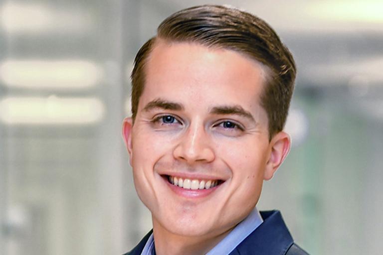 Portrait of Hunter Burke, leadership advisor at Russell Reynolds Associates