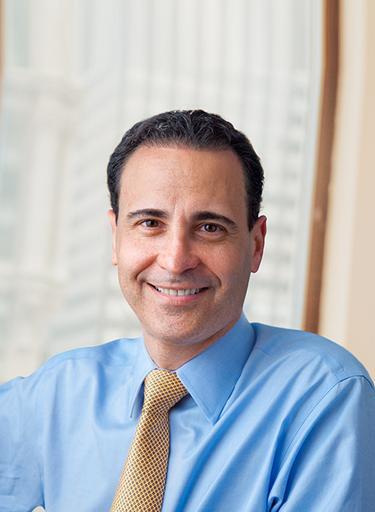 Portrait of Bennett Hanig, PhD, leadership advisor at Russell Reynolds Associates