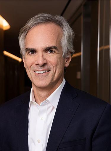 Portrait of Constantine Alexandrakis, CEO of Russell Reynolds Associates