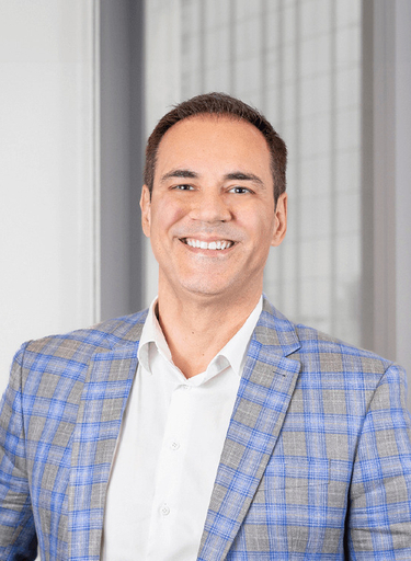 Portrait of Fernando Machado, leadership advisor at Russell Reynolds Associates