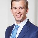 Portrait of Claus Fischer, leadership advisor at Russell Reynolds Associates