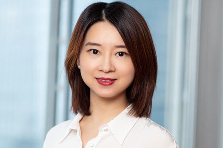 Portrait of Doris Bi, leadership advisor at Russell Reynolds Associates