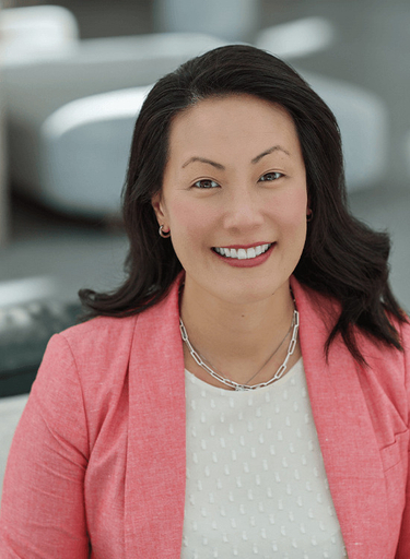 Portrait of Yvonne Lu, leadership advisor at Russell Reynolds Associates