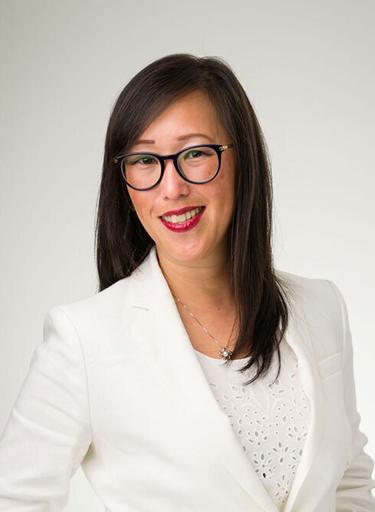 Portrait of Lilly Lin, leadership advisor at Russell Reynolds Associates