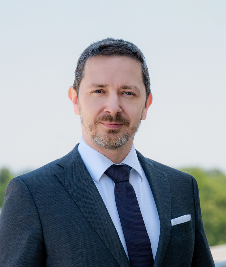 Portrait of Tomasz Huś, leadership advisor at Russell Reynolds Associates