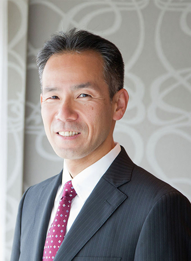 Portrait of Tsutomu Mito, leadership advisor at Russell Reynolds Associates