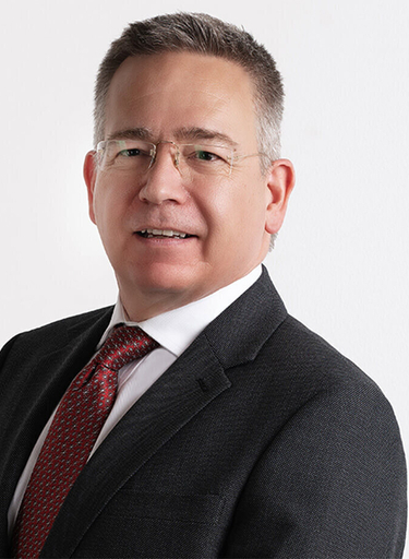 Portrait of Simon Fletcher, leadership advisor at Russell Reynolds Associates