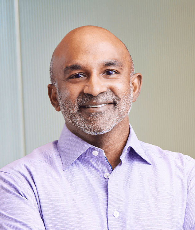 Portrait of Guhan S Selva, leadership advisor at Russell Reynolds Associates.png