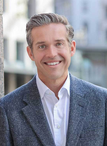 Portrait of Christopher Faralli, leadership advisor at Russell Reynolds Associates