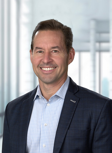 Portrait of William McKinnon, leadership advisor at Russell Reynolds Associates