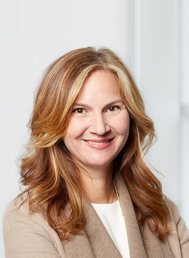 Portrait of Caitlin MacNamara, leadership advisor at Russell Reynolds Associates