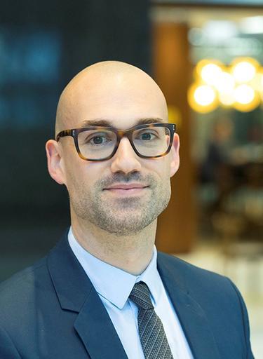 Portrait of Spencer Covey, leadership advisor at Russell Reynolds Associates