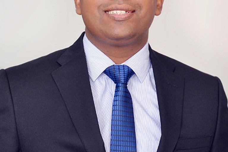 Portrait of Vijuraj Eranazhath, leadership advisor at Russell Reynolds Associates