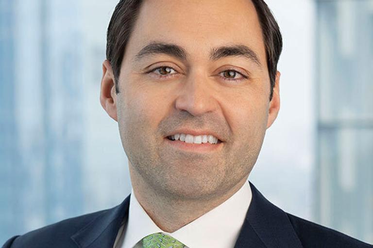 Portrait of John Madera, leadership advisor at Russell Reynolds Associates