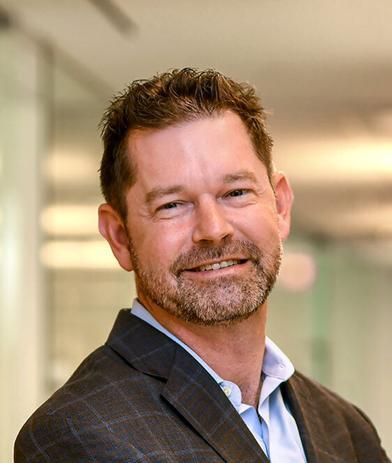 Portrait of Scott E. Smith, leadership advisor at Russell Reynolds Associates