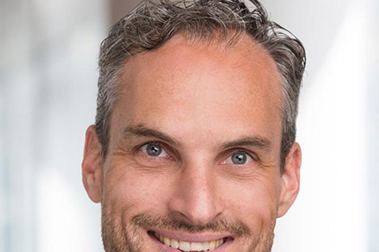 Portrait of Alexander Prokot, leadership advisor at Russell Reynolds Associates