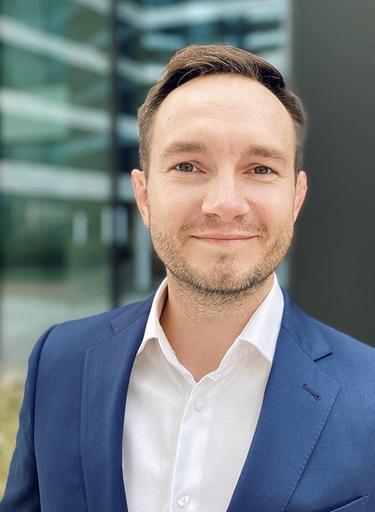 Portrait of Bartek Zachara, leadership advisor at Russell Reynolds Associates