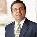 Portrait of Puneet Kalra, leadership advisor at Russell Reynolds Associates