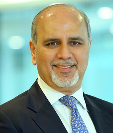 Portrait of Sanjay Kapoor, leadership advisor at Russell Reynolds Associates