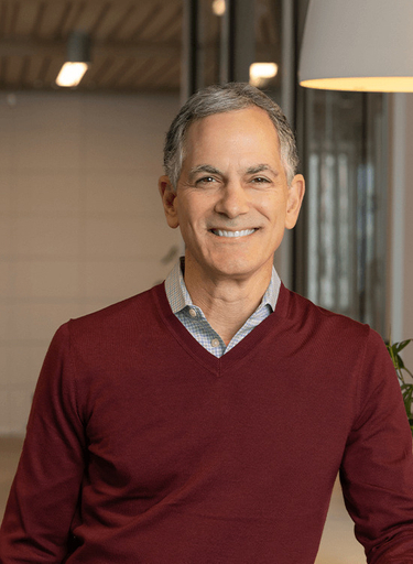 Portrait of Dean Stamoulis, leadership advisor at Russell Reynolds Associates