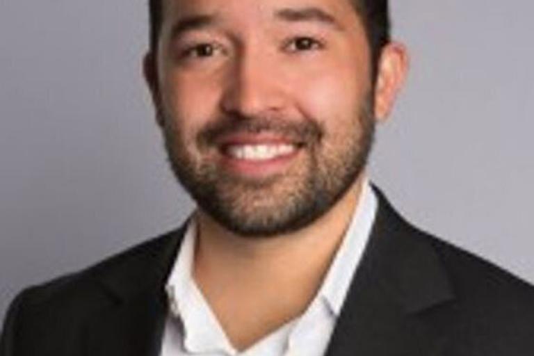 Portrait of Hayden Melecio, leadership advisor at Russell Reynolds Associates