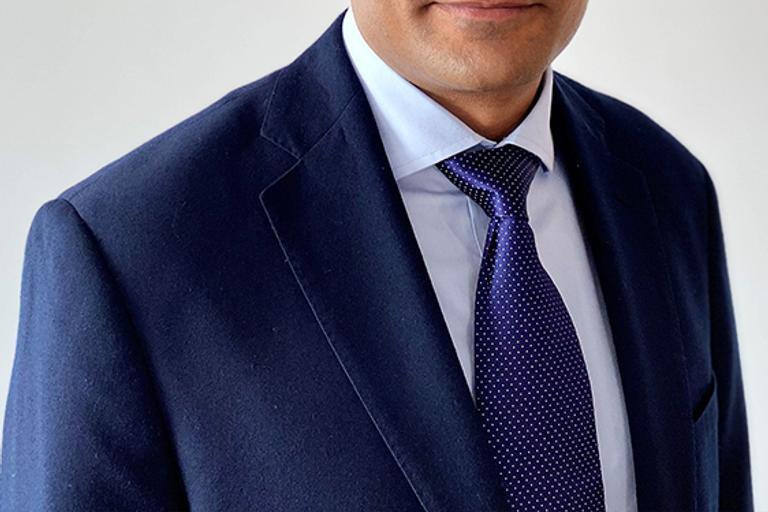 Portrait of Kunal Sharma, leadership advisor at Russell Reynolds Associates