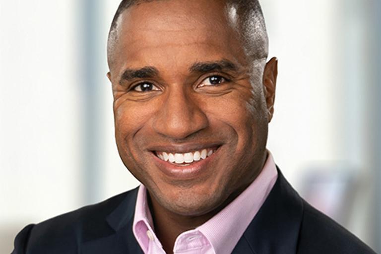 Portrait of Bradlee Benn, leadership advisor at Russell Reynolds Associates