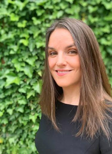 Portrait of Megan Kolodgy, leadership advisor at Russell Reynolds Associates